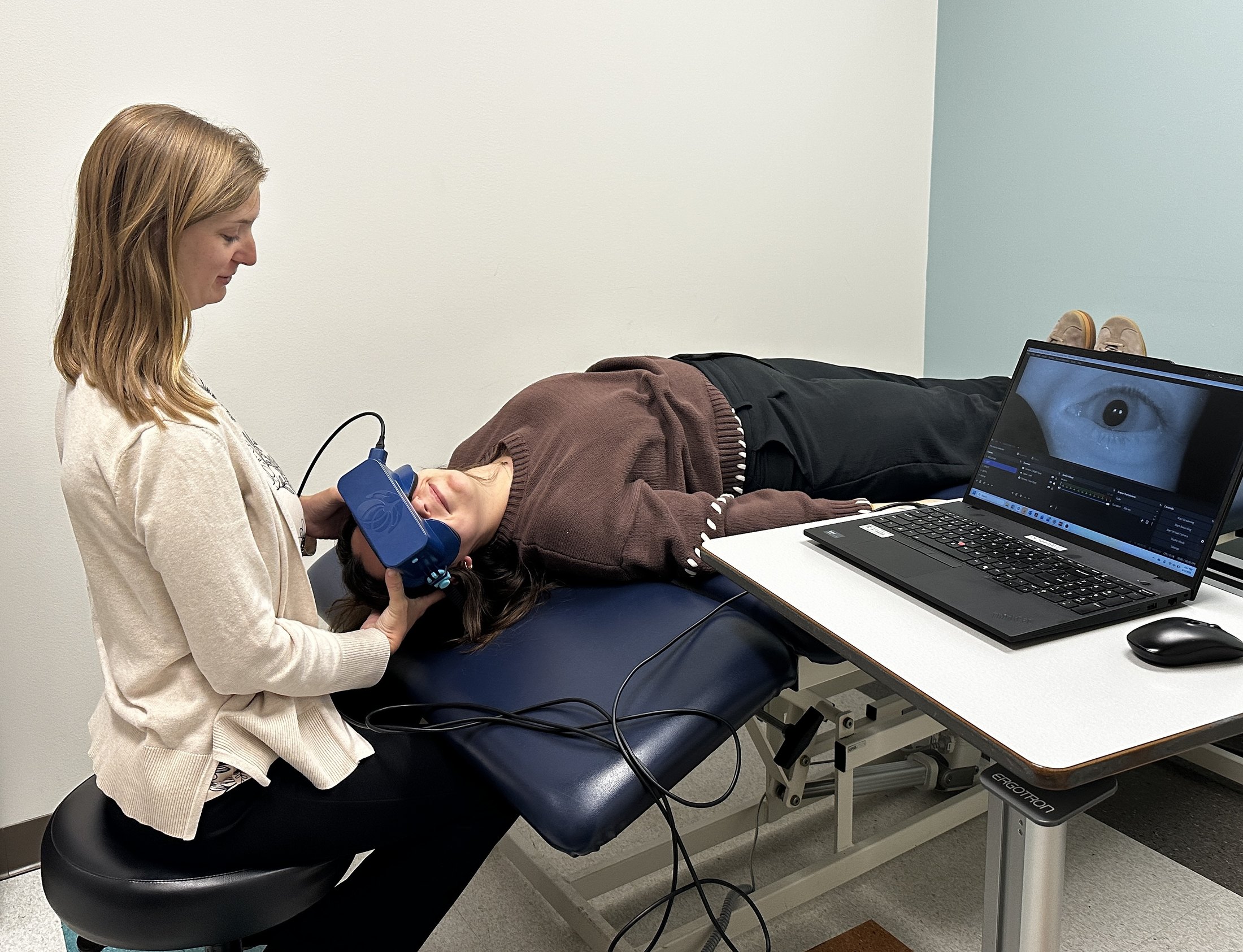 Dr. Pettet administering BPPV assessment and treatment
